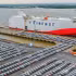 VinFast electric vehicles from Vingroup are being loaded onto a cargo ship at Hai Phong Port for export to international markets. (Photo: AN KHANH)