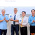 Nguyen Ho Hai (left), Secretary of the Ca Mau Provincial Party Committee, and Lu Quang Ngoi (right), Deputy Secretary of the Provincial Party Committee and Chairman of the Provincial People’s Committee, present commemorative gifts to Ran DaGan, Chairman of Dagan Group (Israel), and Ha Duy Binh, Chairman of VsionGlobal Group. (Photo: NDO)