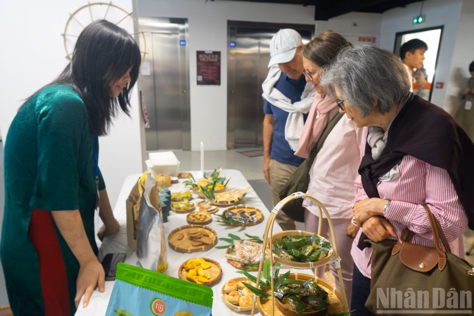 International visitors learn about and experience traditional Vietnamese cuisine.