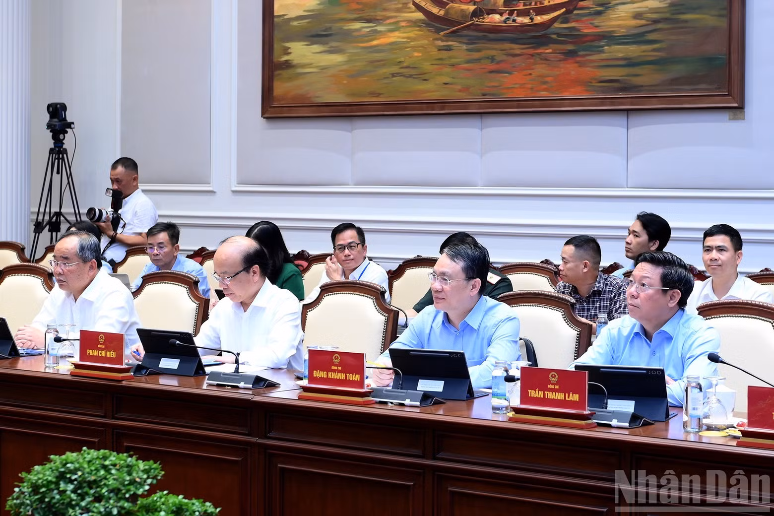 Delegates attend the meeting.