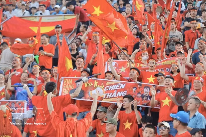 Fans fill the stands to cheer on the Viet Nam national football team. (Photo: VNA)