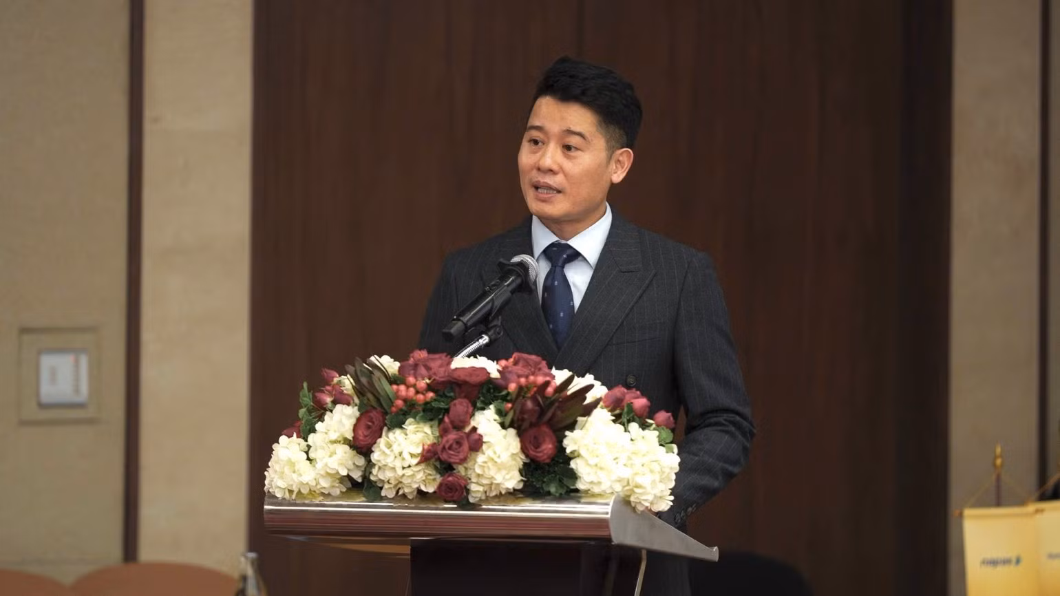 Nguyen Hoang Long, Deputy General Director of NAPAS, speaks at the event. (Photo: Trang Quynh)