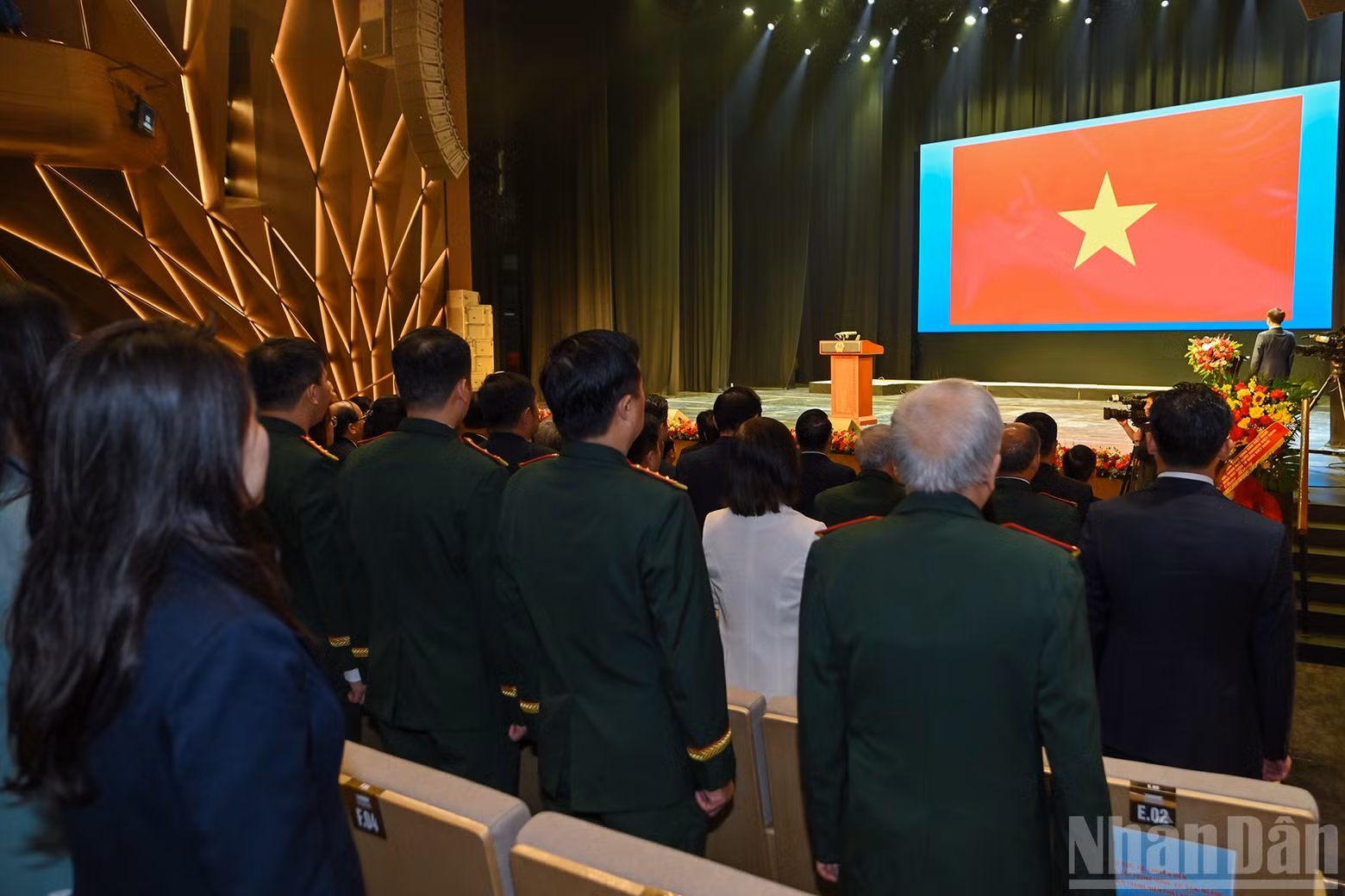 Delegates performed the national anthem salute of both Viet Nam and Laos.